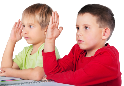 Two School Children Raising Hands in a Class
