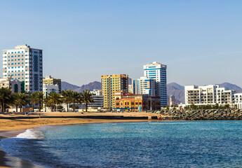 Fototapeta premium Fujairah, UAE - 03.11.2023 - Buildings along the beach. Outdoors