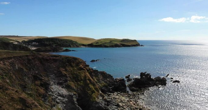 Aerial View Of Across Thurlestone Coastline In South Devon. Ascending Shot