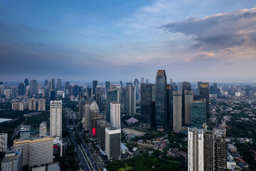 Fototapeta na wymiar aerial shoot of Jakarta skyline during the golden hour. Jakarta is the capital city of indonesia that also one of the most populated city in the world.
