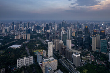 Fototapeta na wymiar aerial shoot of Jakarta skyline during the golden hour. Jakarta is the capital city of indonesia that also one of the most populated city in the world.
