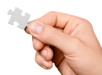 Hand Holding a Puzzle Piece