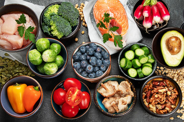 Food for a healthy heart concept and  stethoscope on black background