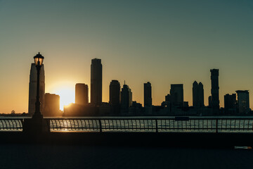 Fototapeta na wymiar view of new jersey at sunset. city silhouette