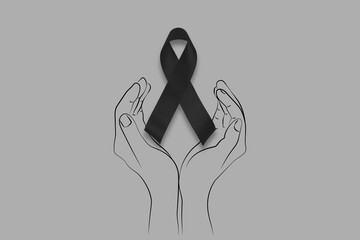 Hand hold black ribbon on background. Mourning is the grieving process. Melanoma and skin cancer,...