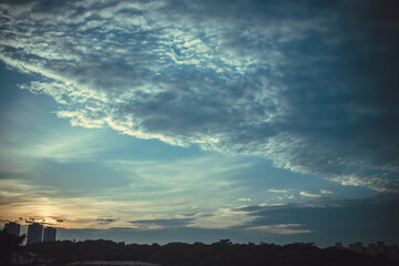 time clouds over sunset