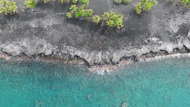 Aerial scenic view favorite vacation spot Kona Village of rich people on Big Island Hawaii USA 4K. Hidden Kona Village hideaway coast with resort for expensive vacation of wealthy American tourists 4K