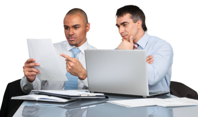 Business men using laptop while making report in office