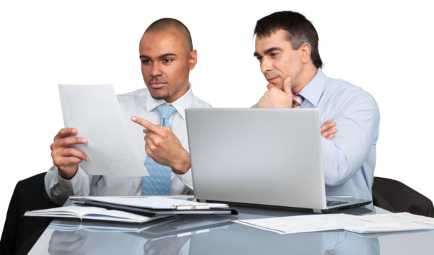 Business men using laptop while making report in office