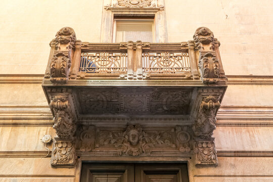 Pavia balcony antique worked workmanship detail near house building panorama