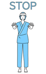 ストップの合図、体の前に手を突き出す頭に包帯を巻いた女性入院患者