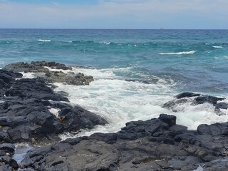 Fototapeta na wymiar Roungh ocean with rocks