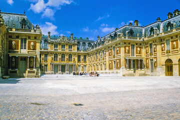 Fototapeta na wymiar Palace of versailles with a group of people