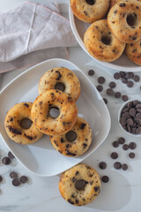 sweet home made chocolate chip donuts on a table