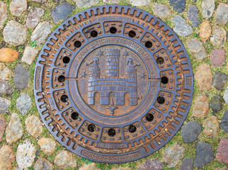 Obraz premium sewer manhole in freiburg germany