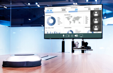 Wireless microphone portable on table with presentation on screen television in meeting room