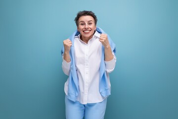 authentic young fashionable dark haired woman with a wide smile