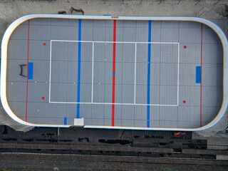 field hockey or ice hockey field. plastic grids of the dportovist surface under which there are...