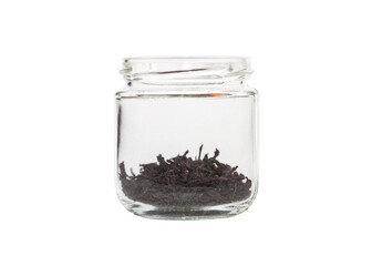 Dry tea leaves in a transparent glass jar. Shui Xiang oolong tea (Water elf from the Wuyi mountains).