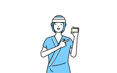 クレジット決済を勧める頭に包帯を巻いた女性入院患者