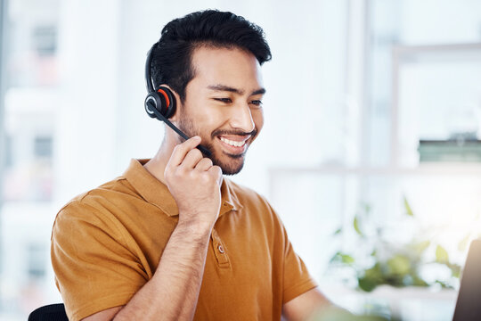 Happy man with smile, callcenter and phone call with contact us, headset and microphone with CRM. Male consultant, communication and tech with customer service job, telecom and help desk agent