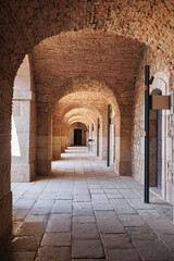 Masonry Arches in the Inner Arcade of Montjuic Castle in Barcelona, Spain