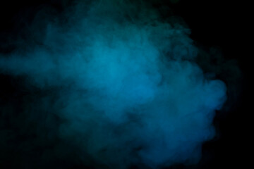 Blue and green steam on a black background.