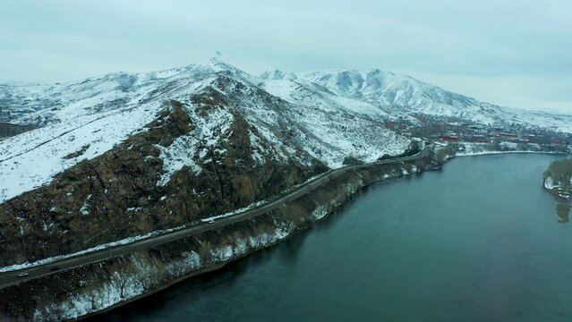 bird's-eye view of mountains, river and city winter day, panoramic view of mountains near the river, Ust Kamenogorsk, Kazakhstan.