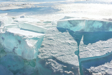 Blue Ice Clear Transparent Hummocks on the Frozen Lake