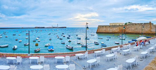Panorama of oceanfront with outdoor dining, Cadiz, Spain