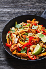 chicken fajitas with bell peppers, onion, spices