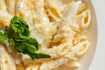 Pasta with four cheese sauce