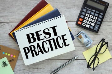 Best Practice, Business Concept. text on three notebooks on a wooden table