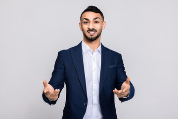 Happy turkish guy buisneesman in process speaks while shirt smart suit ellegant posing at camera.