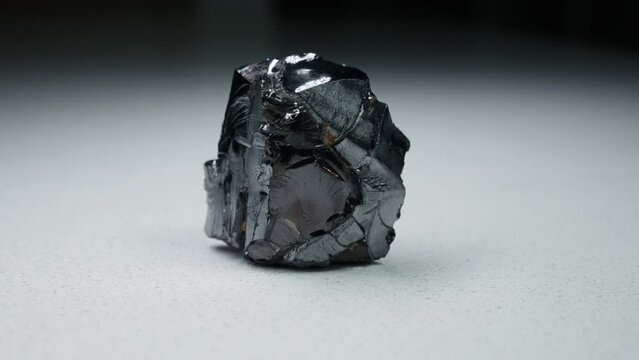 4k 30p Russian Elite Shungite Crystal Stone. Macro nature crystal gemstone high-quality product shots.
