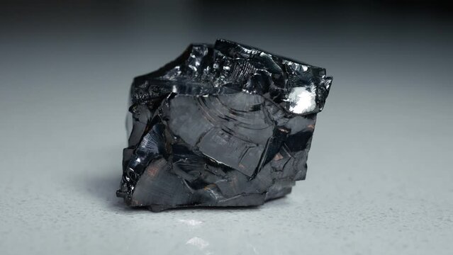 4k 30p Russian Elite Shungite Crystal Stone. Macro nature crystal gemstone high-quality product shots.