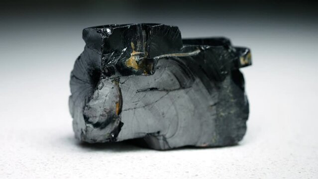 4k 30p Russian Elite Shungite Crystal Stone. Macro nature crystal gemstone high-quality product shots.