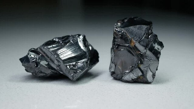 4k 30p Russian Elite Shungite Crystal Stone. Macro nature crystal gemstone high-quality product shots.