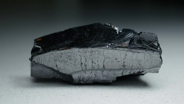 4k 30p Russian Elite Shungite Crystal Stone. Macro nature crystal gemstone high-quality product shots.