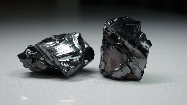 4k 30p Russian Elite Shungite Crystal Stone. Macro nature crystal gemstone high-quality product shots.