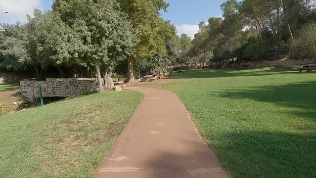 Walking among the paths in the Ein Hamad nature reserve in Jerusalem - Israel. A bright summer day