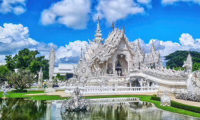 Fototapeta premium Famous Thailand temple or grand white church, Wat Rong Khun,at Chiang Rai province, northern Thailand