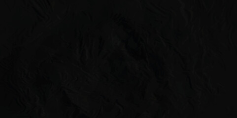 The texture of Black crumpled paper. Crumpled Black paper texture background. 