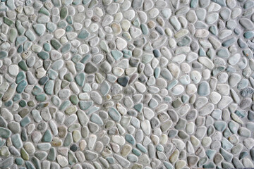 Pebble stone wall texture . Tiles Design for Floor. Background of cobblestone wall texture for design and decoration. 