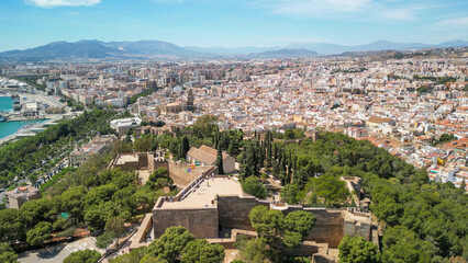 Fototapeta na wymiar Malaga, Andalusia. Aerial view of city skyline from the castle on a beautiful spring day