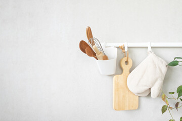  utensils hanging on wall in kitchen room 