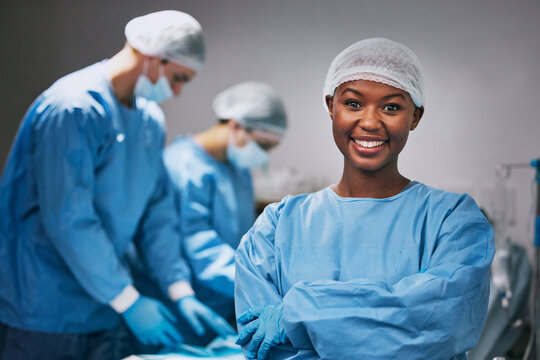 Surgery, Portrait And Black Woman Doctor In Theater For Hospital Teamwork, Leadership And Medical Internship. Happy Surgeon, Nurse Or Healthcare Person Arms Crossed In Operating Room Or Theatre