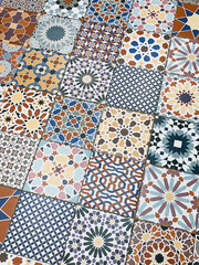 Distinctive and colorful patterns of floor tiles of stores in Thailand.