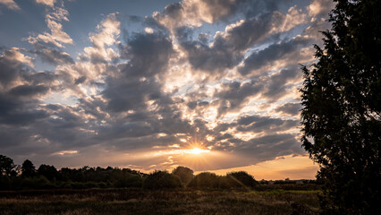 Sunset in the valley of the Narew River in summer.