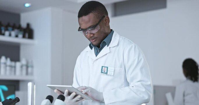 Research, science and digital tablet by black man scientist in a laboratory for healthcare, plan and innovation. Online, search and African guy health expert on internet for medical, solution or idea